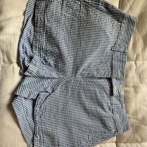 Blue shorts with white stripes